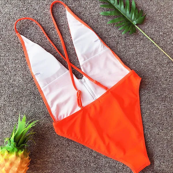 Deep Cut V Neck Zip Detail One Piece Jessie